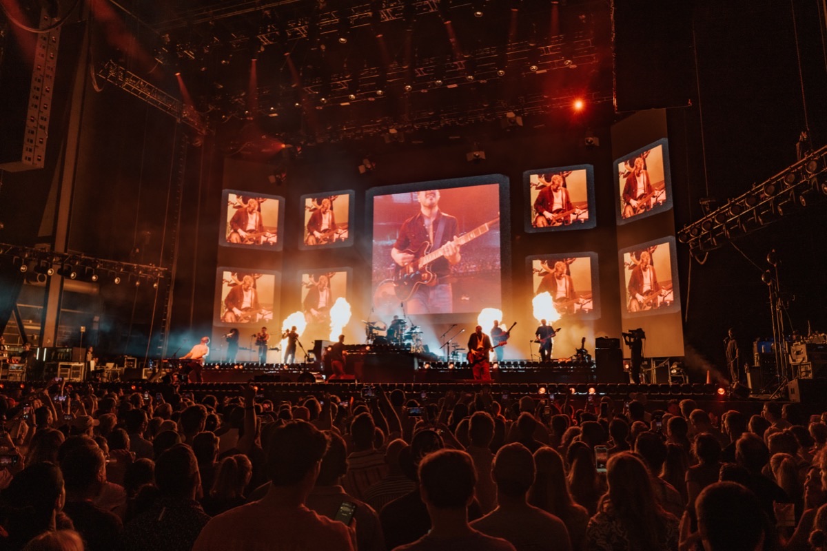 Mumford and Sons in Atlanta, the band on a grid of LED screens above the stage with pyro